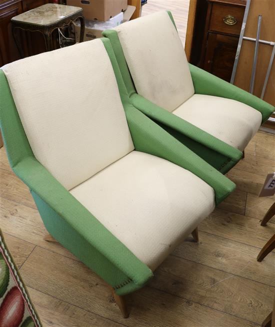 A pair of 1960s green and cream upholstered armchairs